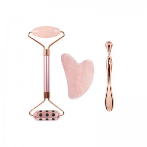 Массажер нефритового лица на лице